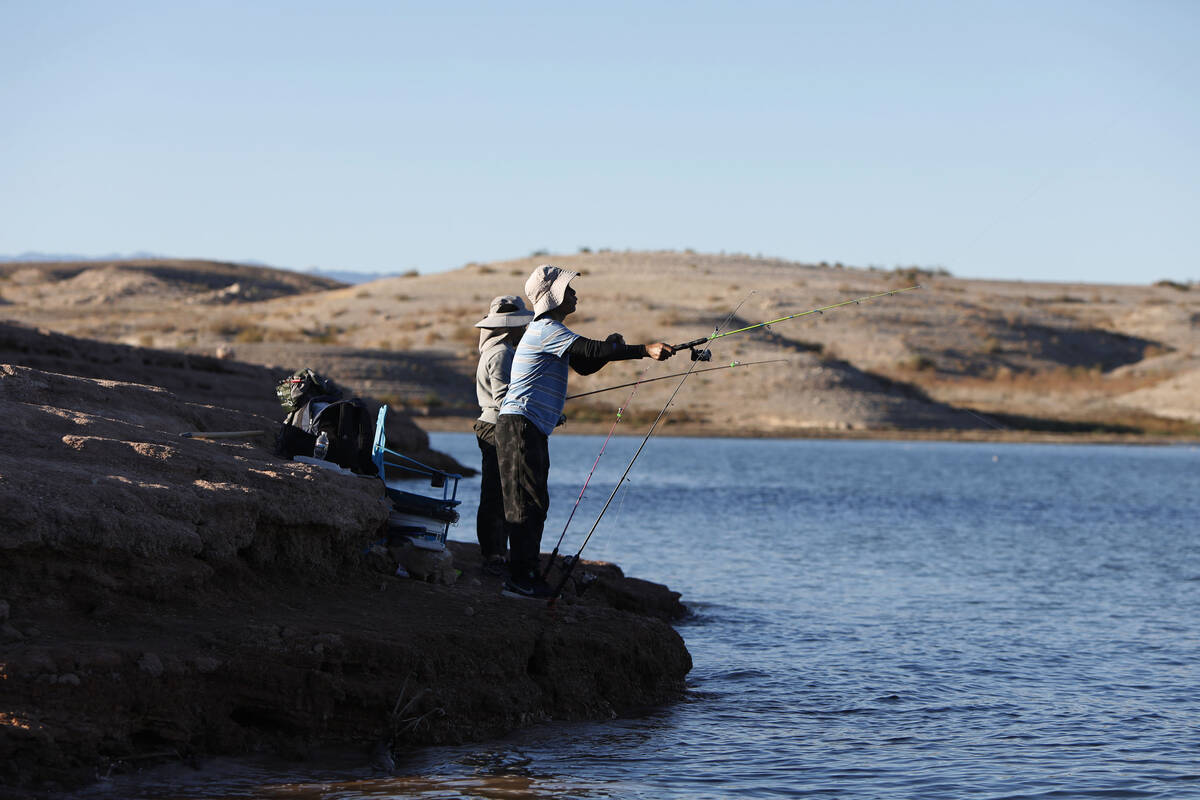 People fish at Lake Mead near Boulder City on Friday, Nov. 12, 2021. (Chitose Suzuki / Las Veg ...