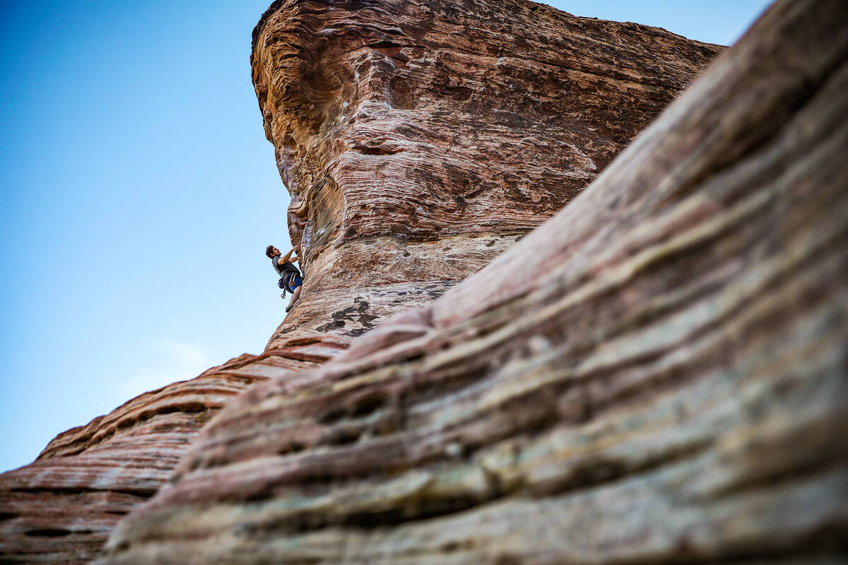 Alex King, of Denver, climbs a route at Calico Basin on the eastern edge of the Red Rock Canyon ...