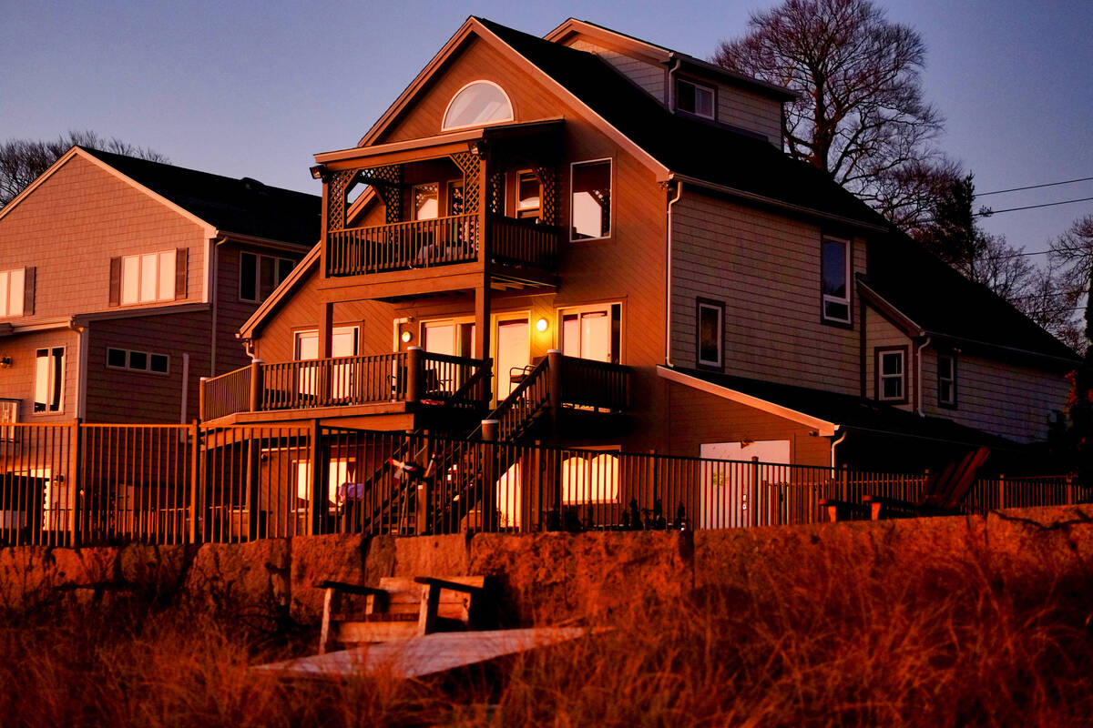 The early morning sun lights up the home at 500 Pequot Ave, along the Thames River, pictured on ...