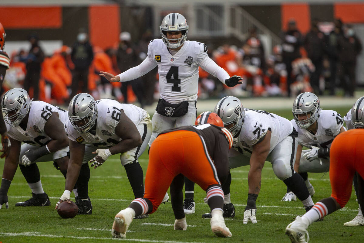 Las Vegas Raiders quarterback Derek Carr (4) calls a play at the line of scrimmage during the 1 ...