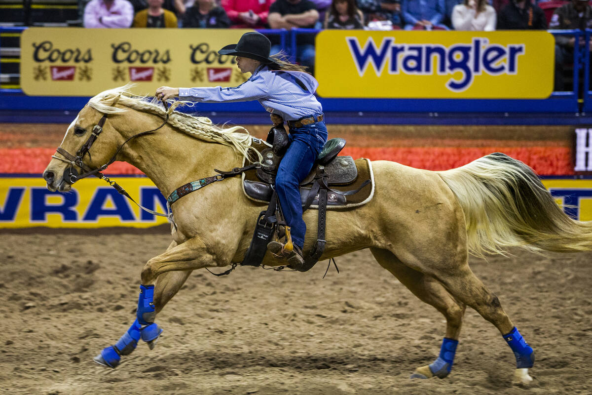 Hailey Kinsel of Cotulla, Texas, heads for home in Barrel Racing at the tenth go round of the W ...