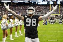 Raiders defensive end Maxx Crosby (98) is announced before the start of an NFL football game ag ...