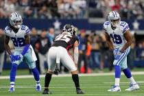 Dallas Cowboys wide receiver Amari Cooper (19) and CeeDee Lamb (88) line up for the snap during ...