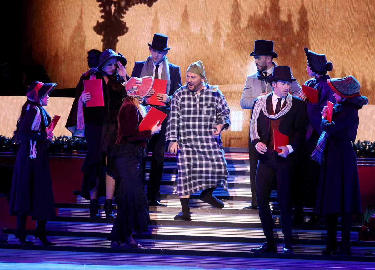 The full cast, including Randal Keith as Scrooge, center, during a preview of "This Is Chr ...