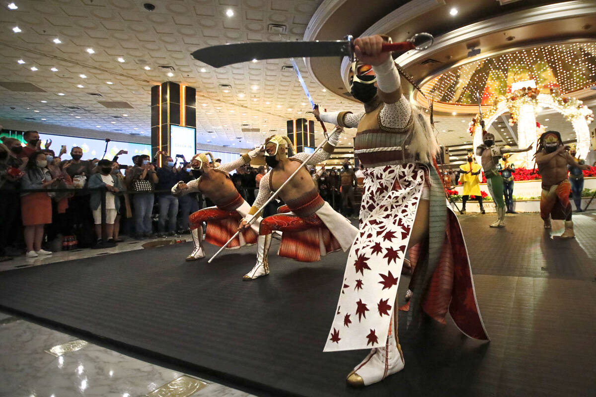 Cirque Du Soleil's KÀ artists perform battle scenes during a pop-up performance in the lobby o ...