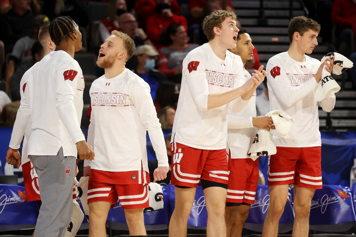 The Wisconsin Badgers bench reacts after a play during the first half of the NCAA Maui Invitati ...