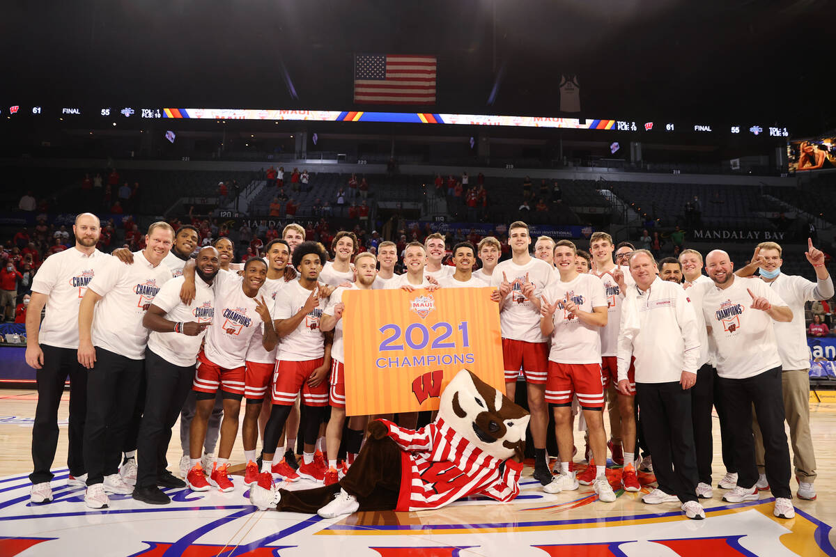 The Wisconsin Badgers celebrate their win against St. Mary's Gaels in the NCAA Maui Invitationa ...