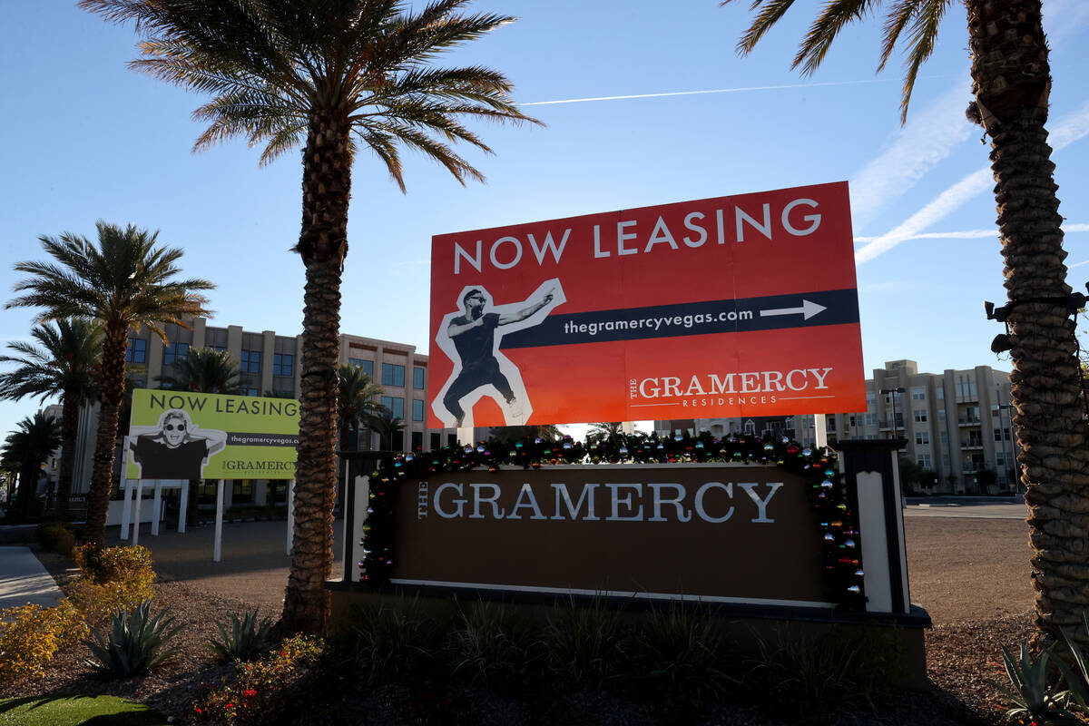 Commercial buildings, left, and an apartment building, right, at The Gramercy, a mixed-use deve ...