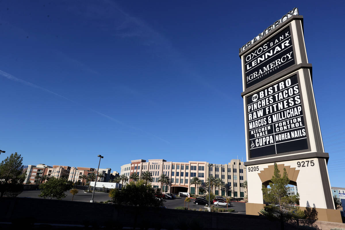 Apartment buildings, left, and commercial buildings, right, at The Gramercy, a mixed-use develo ...