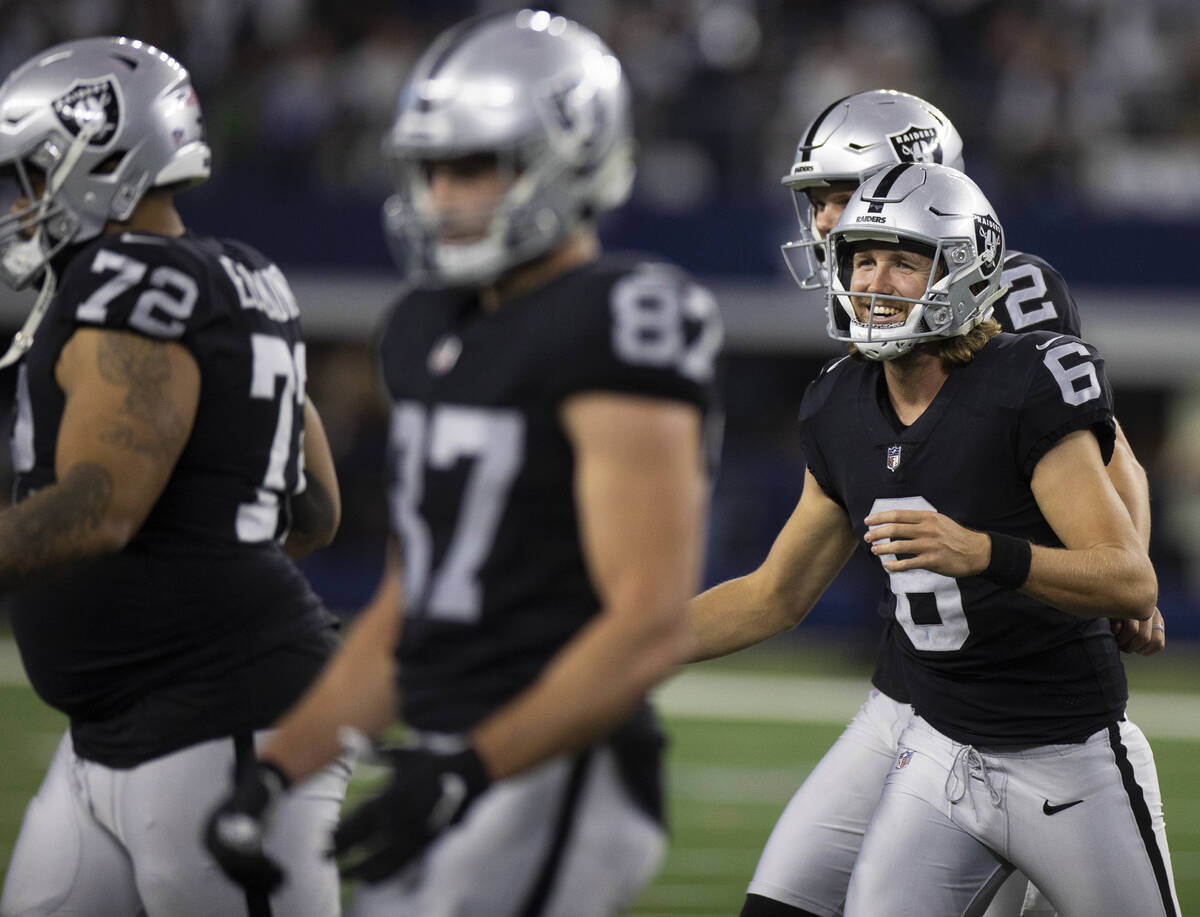 Raiders punter A.J. Cole (6) celebrates a second half field goal with teammates during an NFL f ...