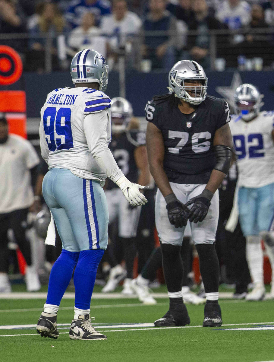 Dallas Cowboys defensive tackle Justin Hamilton (99) looks on after Raiders guard John Simpson ...