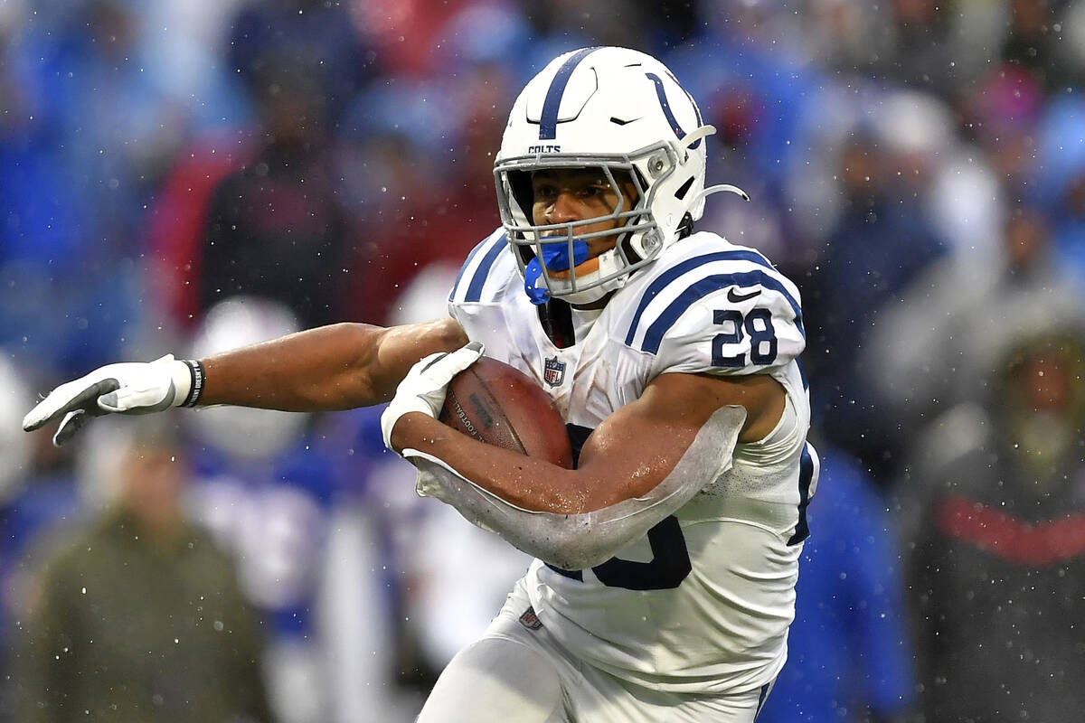 Indianapolis Colts running back Jonathan Taylor (28) plays during the second half of an NFL foo ...