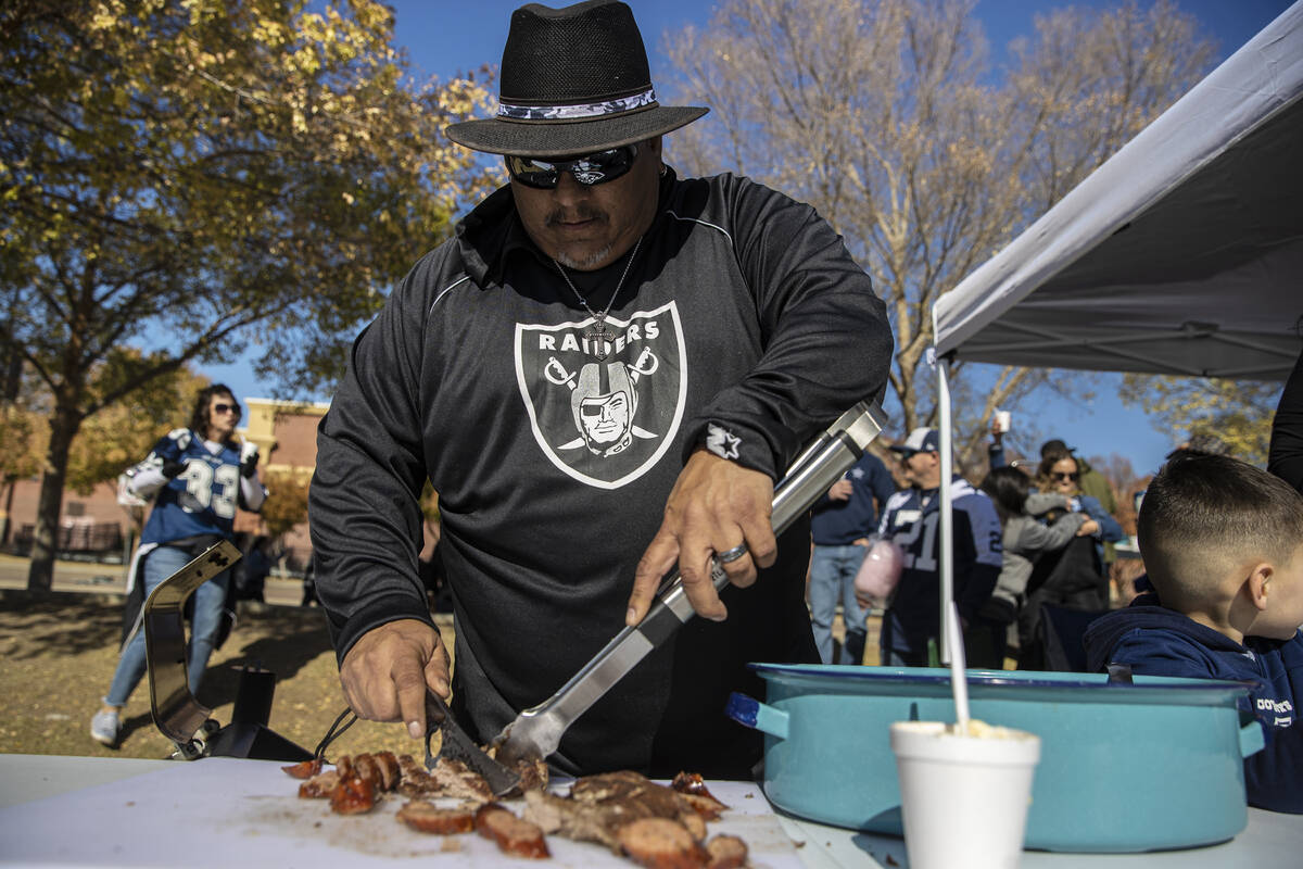 Raiders fans before the start of an NFL football game against the Dallas Cowboys on Thursday, N ...