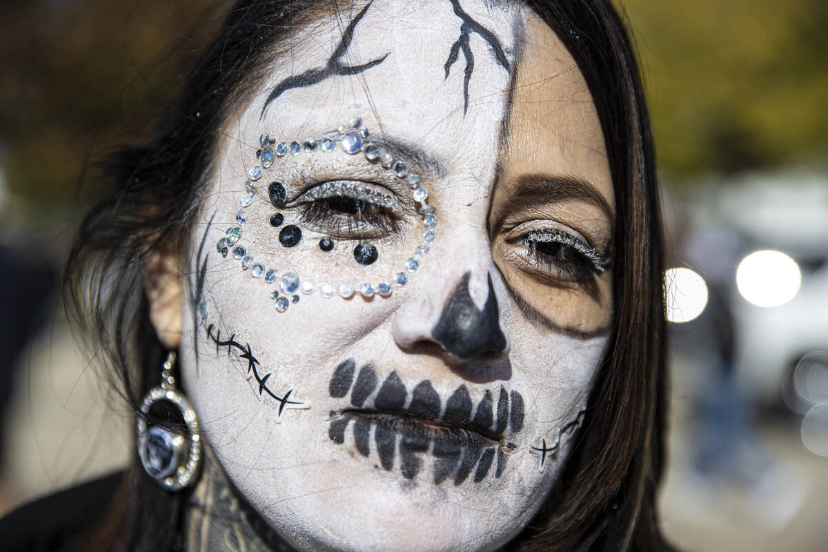 Raiders fans Angelia Martinez before the start of an NFL football game against the Dallas Cowbo ...