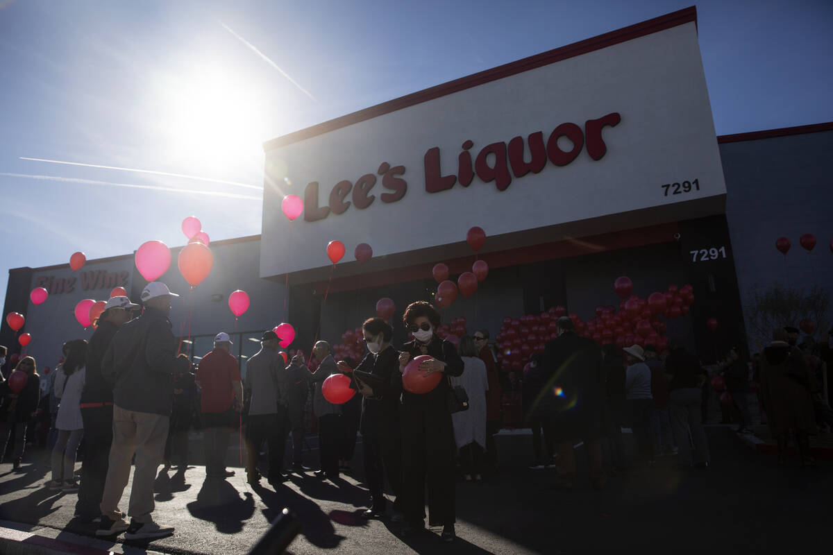 Family, friends and members of the public attend a vigil to the late Kenny Lee, the heir to Lee ...