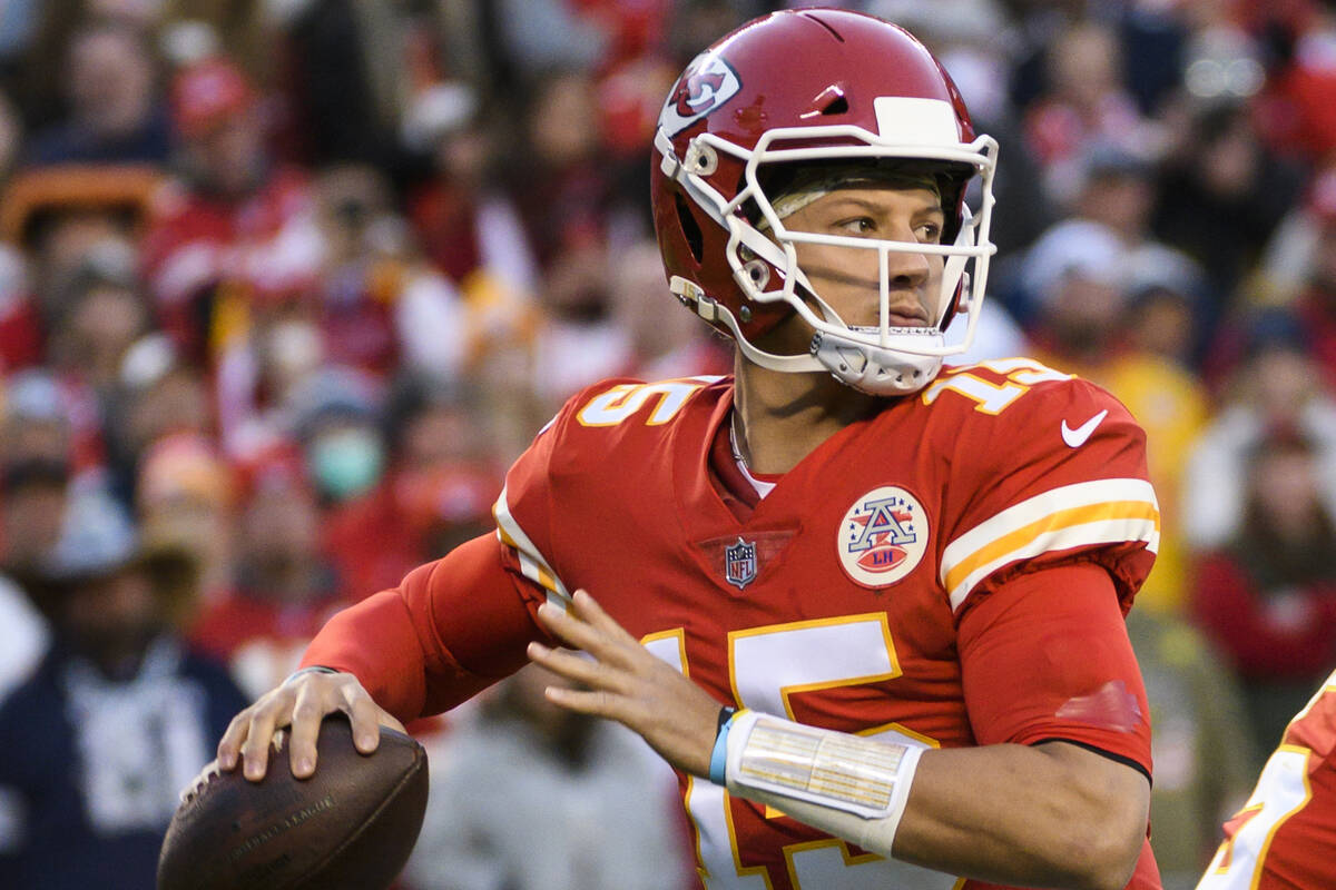 Kansas City Chiefs quarterback Patrick Mahomes looks to throw against the Dallas Cowboys during ...