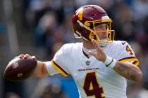 Washington Football Team quarterback Taylor Heinicke passes against the Carolina Panthers durin ...