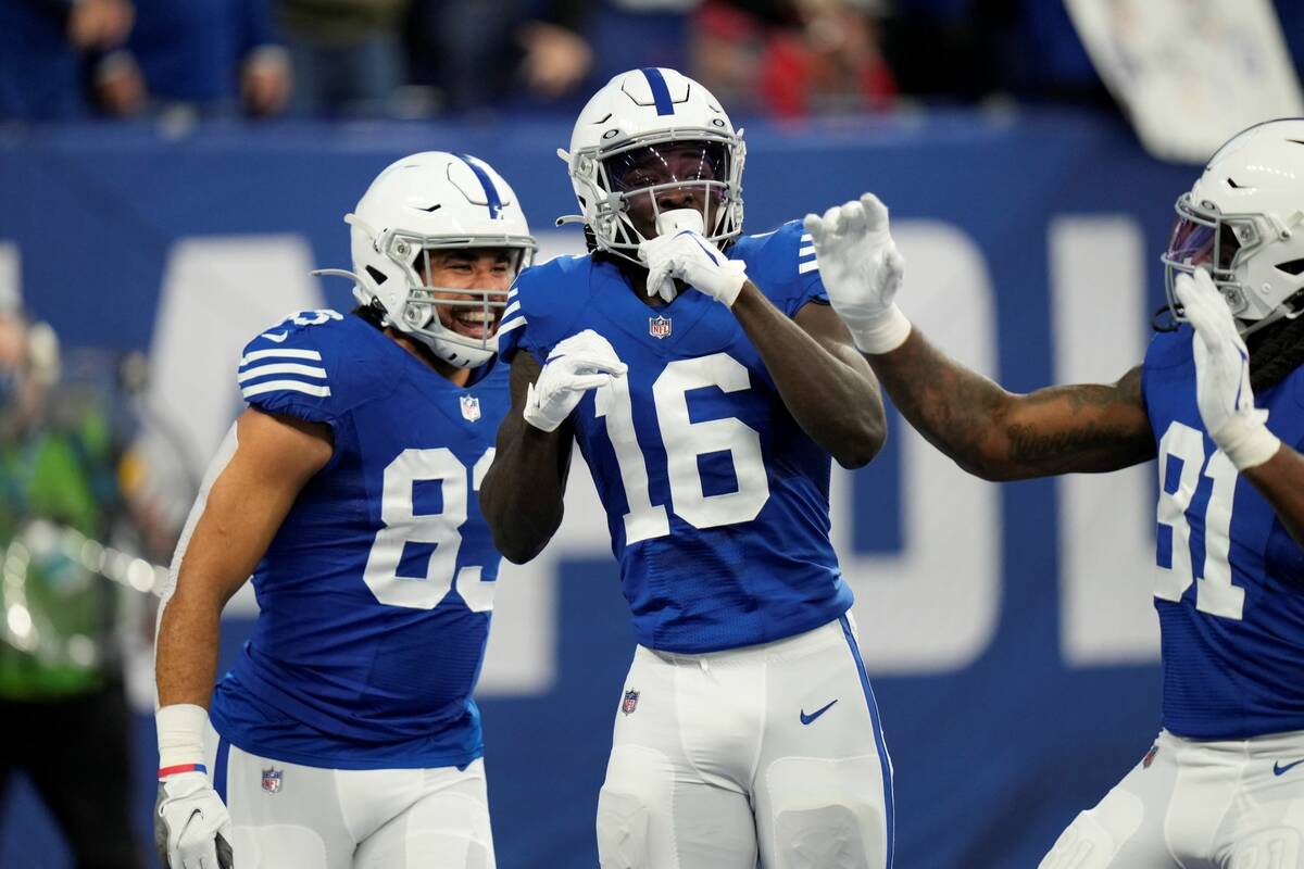 Indianapolis Colts' Ashton Dulin (16) celebrates a touchdown reception during the first half of ...