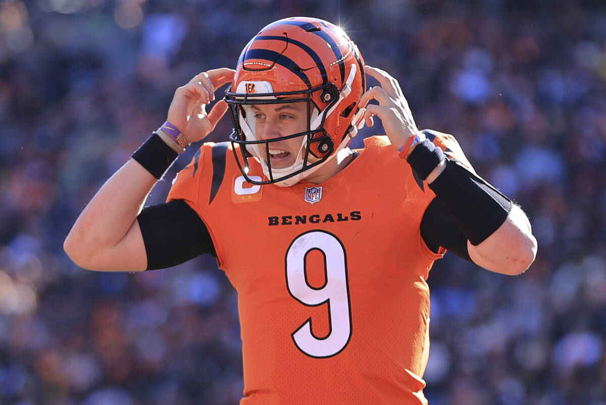 Cincinnati Bengals quarterback Joe Burrow (9) calls signals as he plays against the Pittsburgh ...
