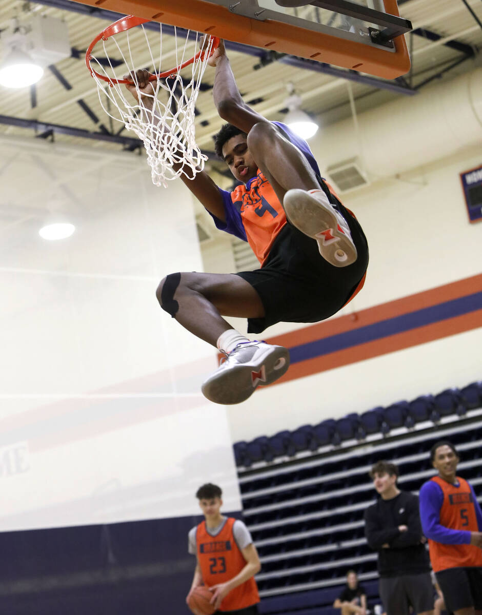 Jase Richardson dunks during a basketball practice at Bishop Gorman High School, Friday, Nov. 2 ...