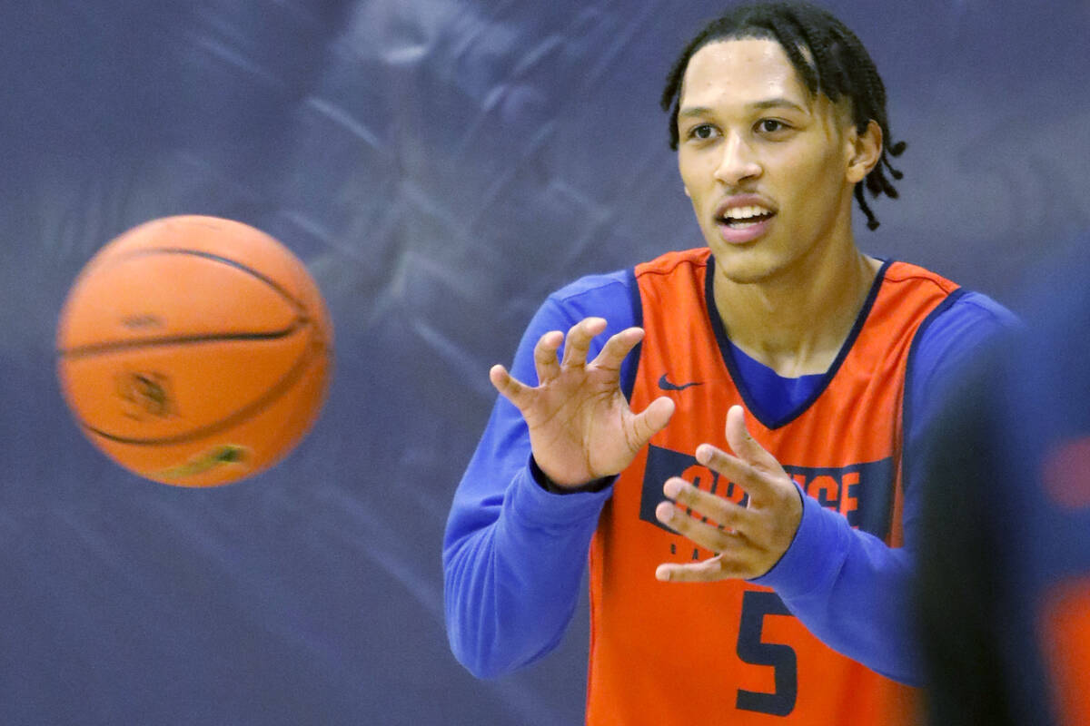 Darrion Williams receive a pass during a basketball practice at Bishop Gorman High School, Frid ...