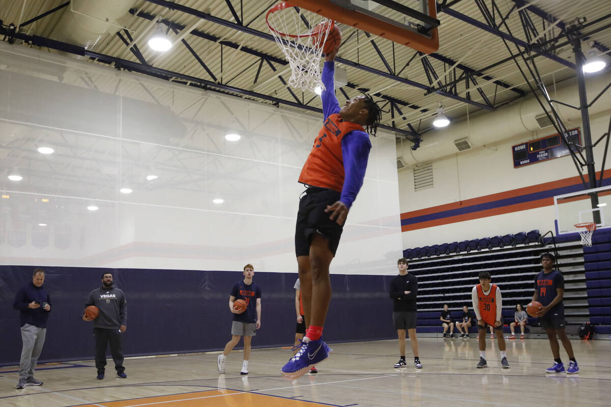 Darrion Williams goes to the basket during a basketball practice at Bishop Gorman High School, ...