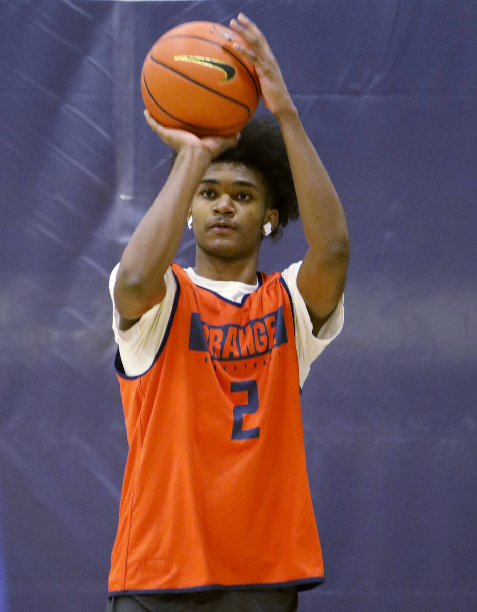 Keenan Bey shoots the ball during a basketball practice at Bishop Gorman High School, Friday, N ...