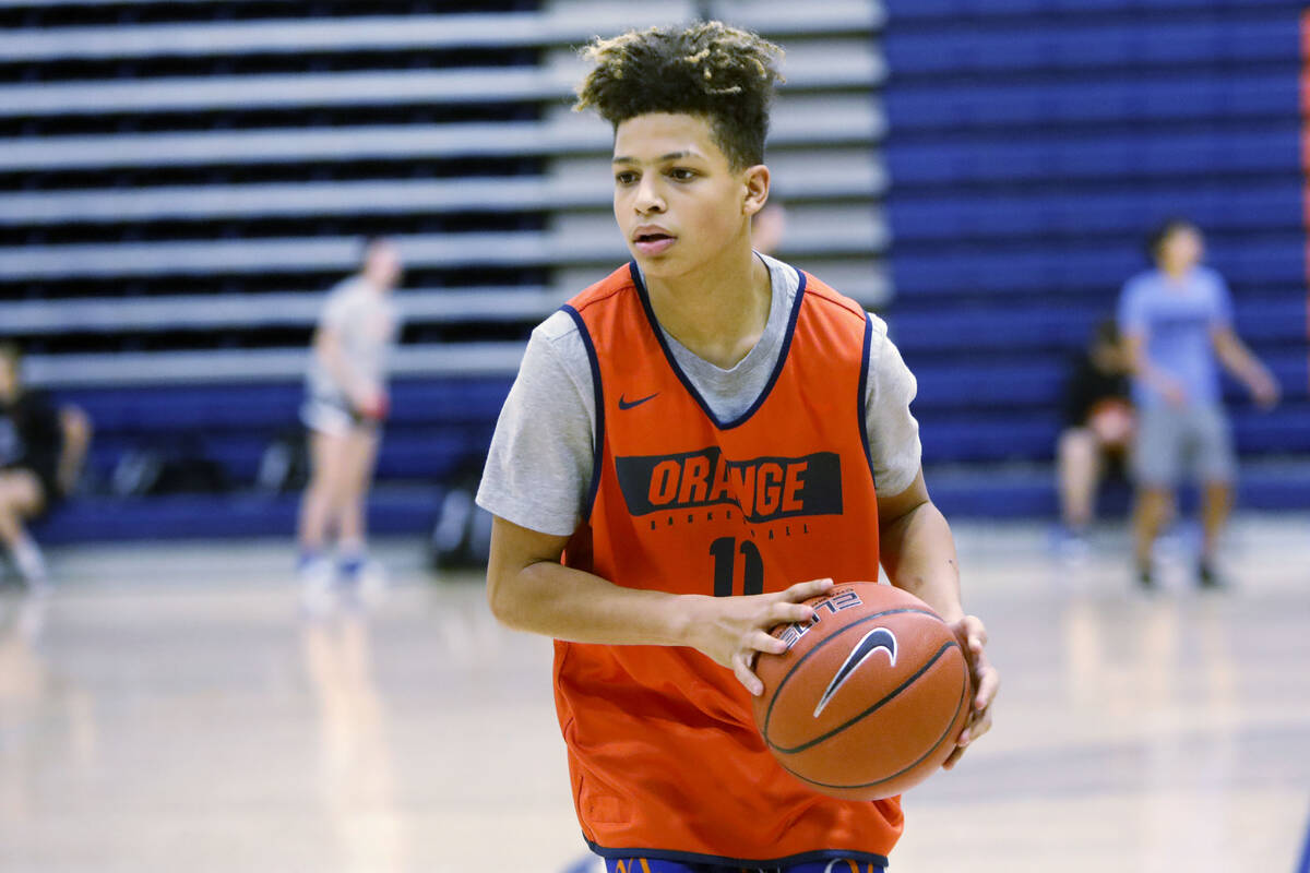Juni Mobley looks to pass during a basketball practice at Bishop Gorman High School, Friday, No ...