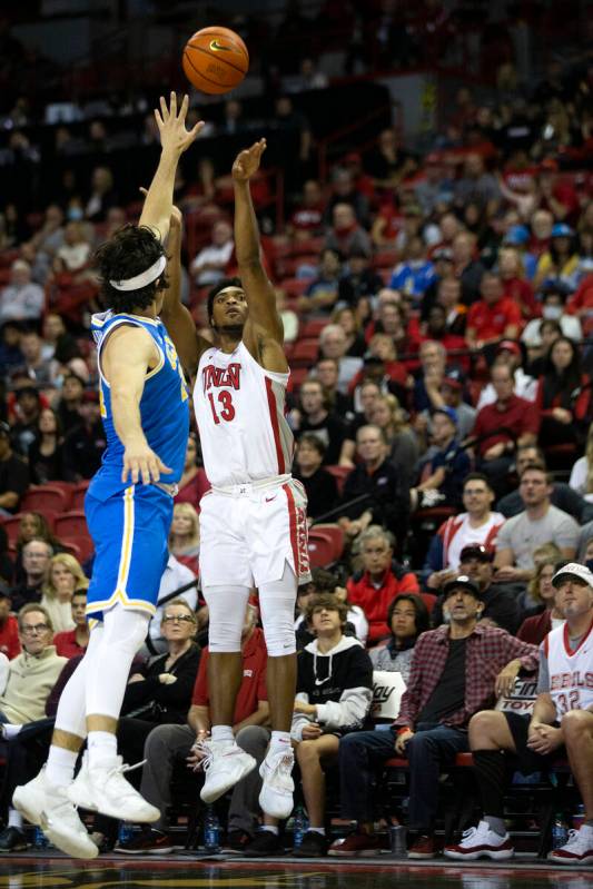 UNLV Rebels guard Bryce Hamilton (13) shoots against UCLA Bruins guard Jaime Jaquez Jr. (24) du ...