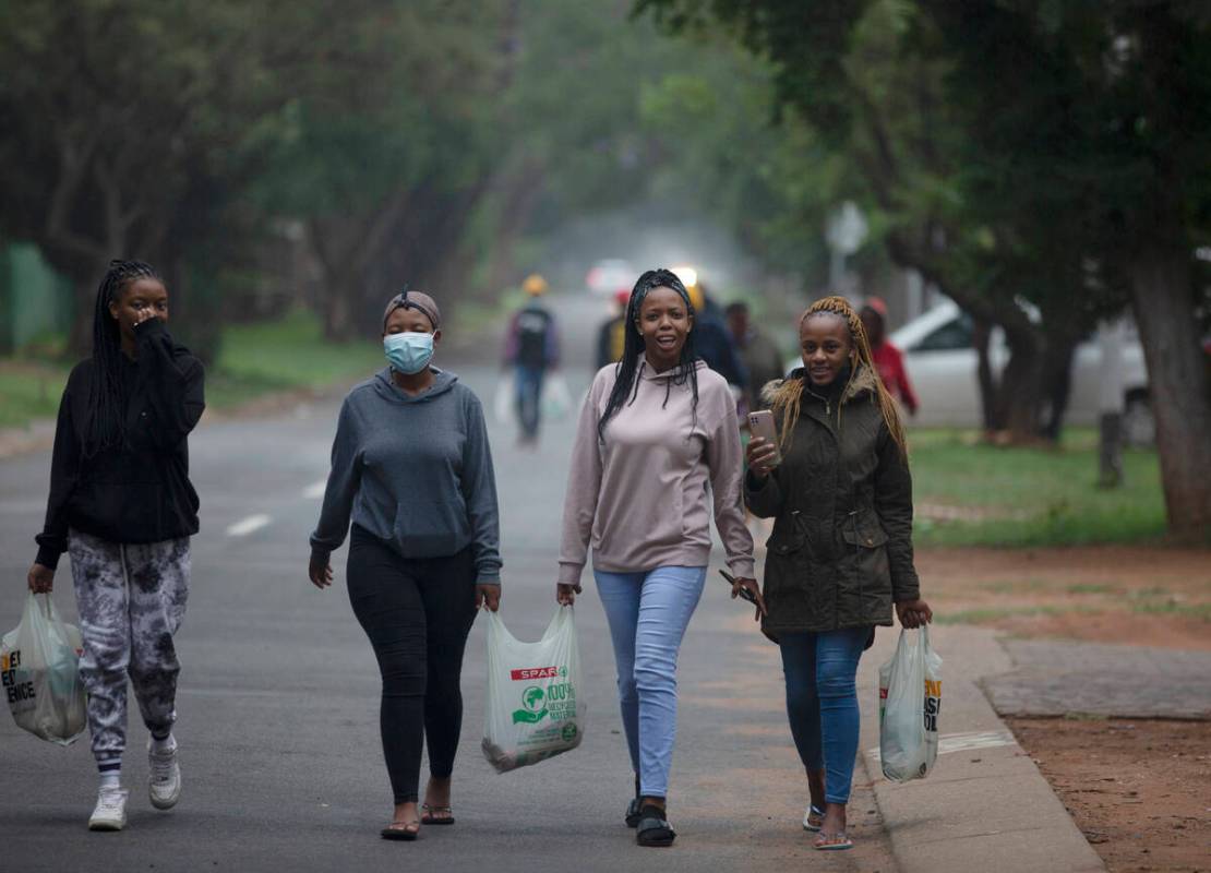 Students from the Tshwane University of Technology make their way back to their residence in Pr ...