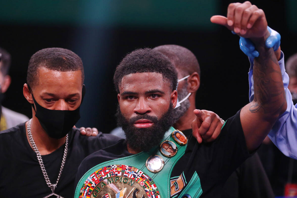 Stephen Fulton raises his arm in victory after his majority decision win against Brandon Figuer ...