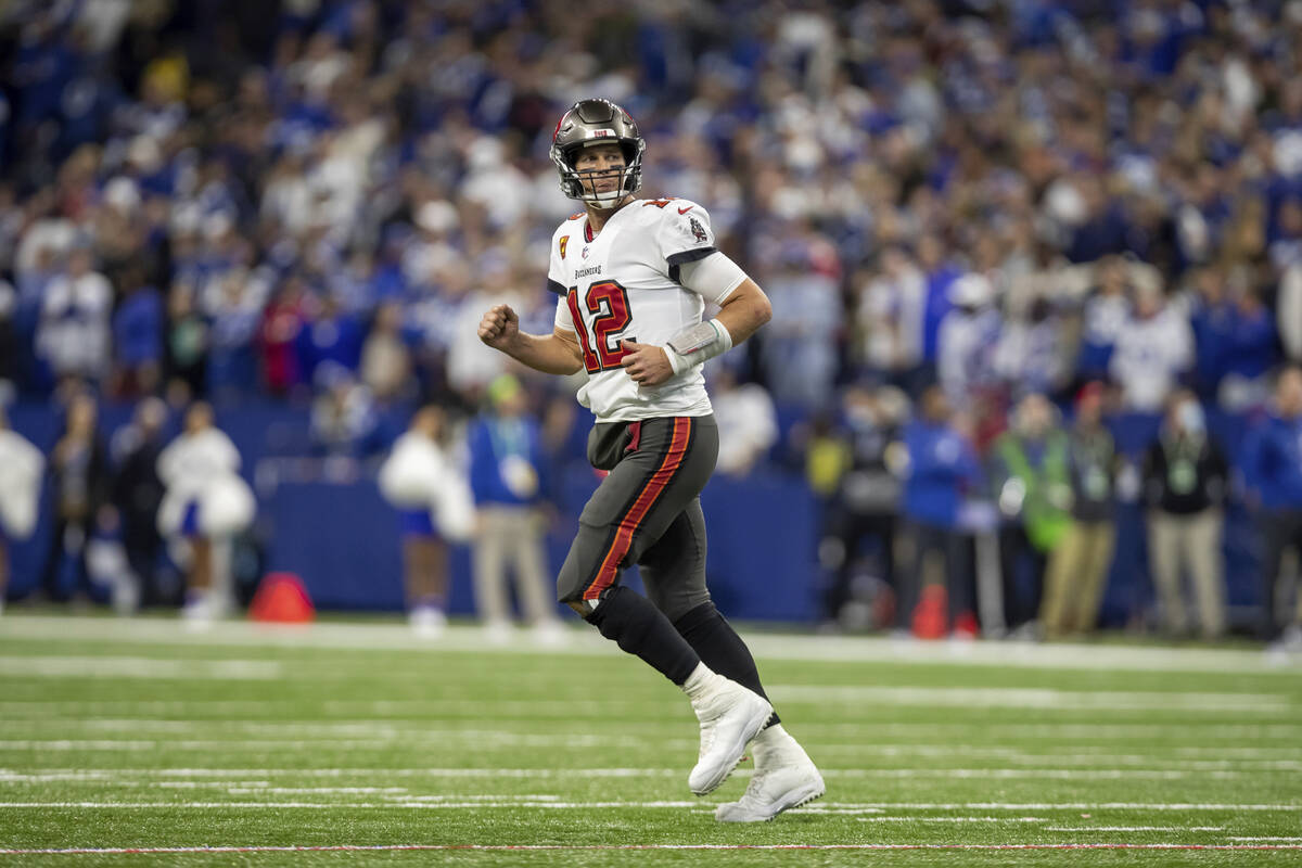 Quarterback (12) Tom Brady of the Tampa Bay Buccaneers walks off the field  after a Buccaneer to …