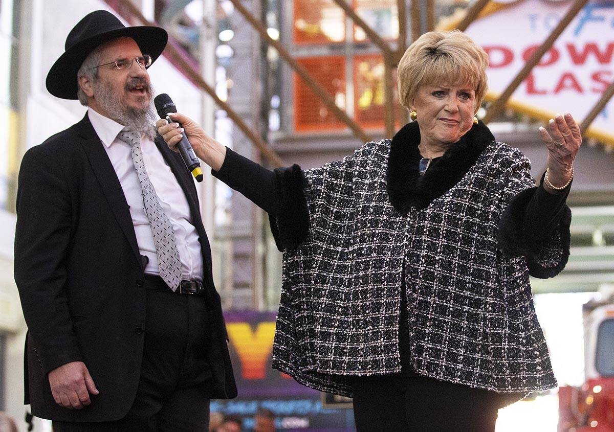 Rabbi Shea Harlig, left, and Mayor Carolyn Goodman address the crowd during a celebration of th ...