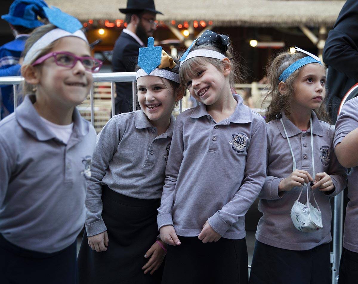 Desert Torah Academy Children's Choir waits to perform during a celebration of the first night ...