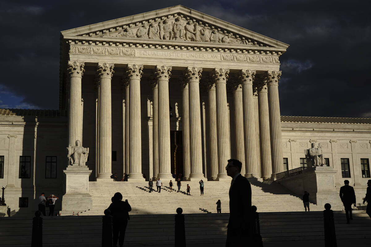 FILE - The Supreme Court is seen at dusk Oct. 22, 2021, in Washington. (AP Photo/J. Scott Apple ...