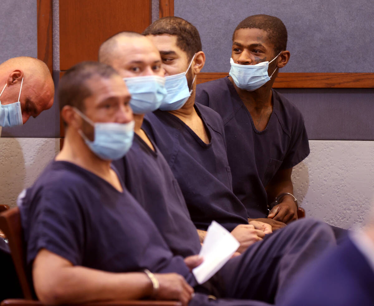 James Vaughn, 26, right, waits to appear in court at the Regional Justice Center in Las Vegas T ...