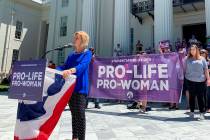 Beck Gerritson, president of Eagle Forum of Alabama, speaks at an anti-abortion rally outside t ...