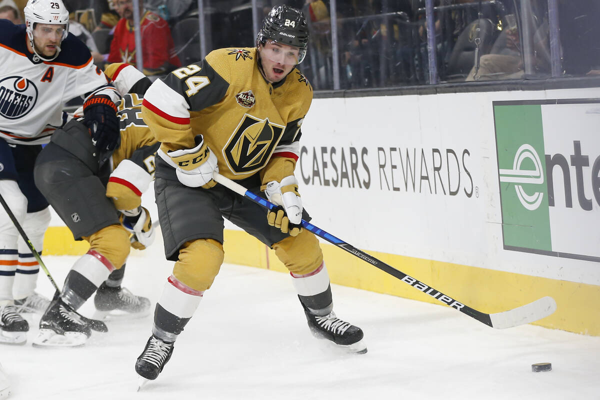 Vegas Golden Knights center Adam Brooks (24) looks to pass against the Edmonton Oilers during t ...