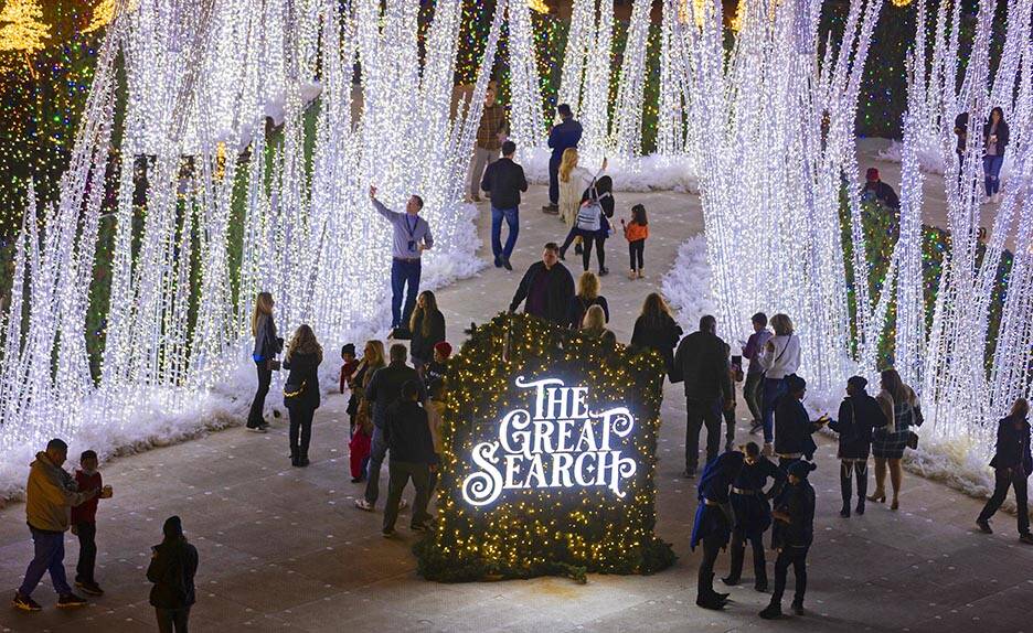 Attendees explore Enchant Christmas at Las Vegas Ballpark on Tuesday, Nov. 30, 2021, in Las Veg ...