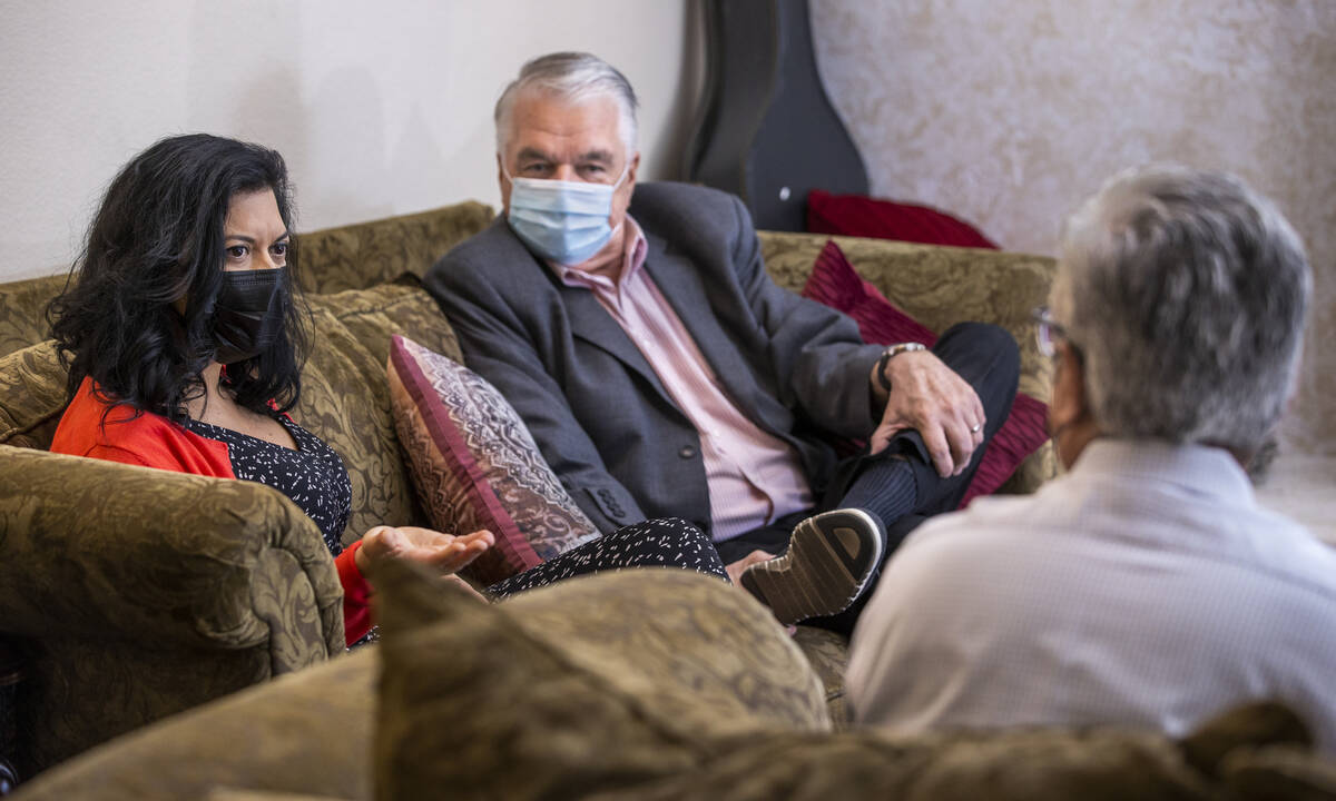 Nurse practitioner Geoconda Hughes, left, talks about the impact of COVID-19 on their family wi ...