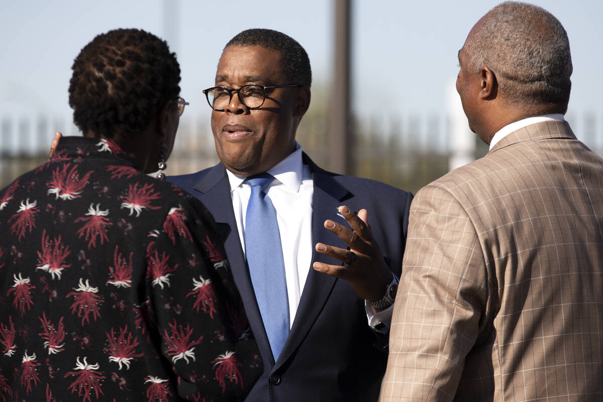 Las Vegas City Councilman Cedric Crear speaks with attendees of the dedication for the new Hist ...