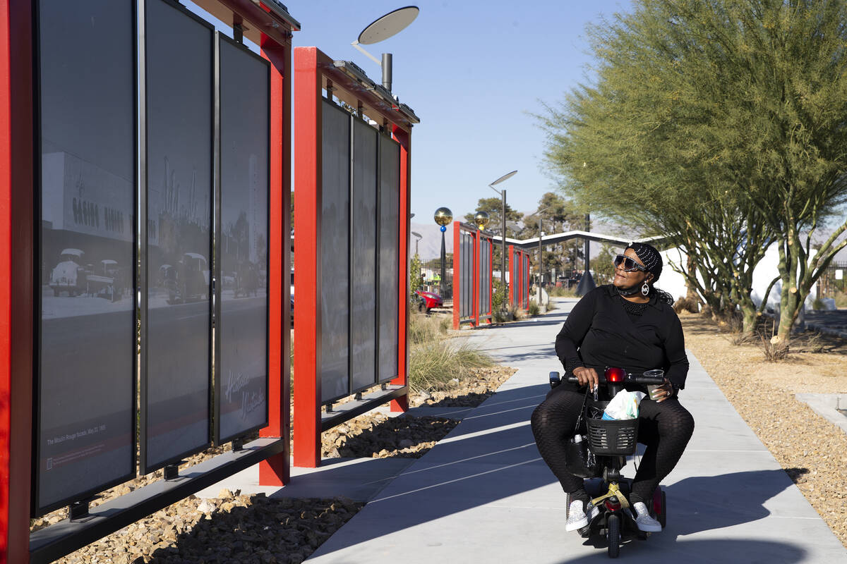 Sandra King views the Historic Westside timeline at the new Historic Westside Legacy Park on Sa ...