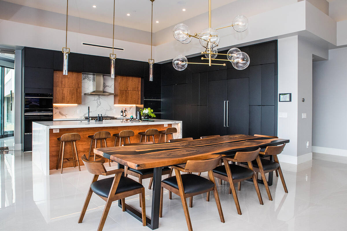 Tonya Harvey Real Estate Millions This home's kitchen features a 12-foot central island with C ...