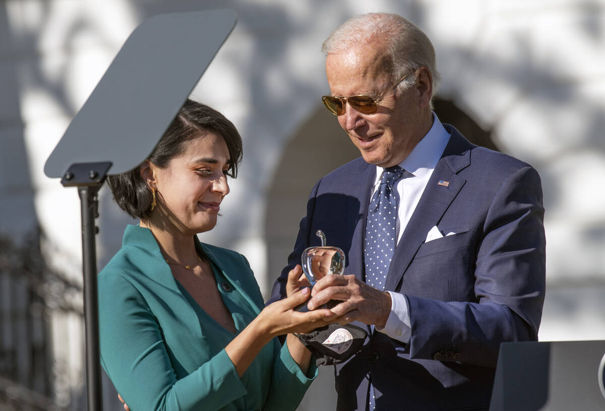 National Teacher of the Year Juliana Urtubey, left, receives recognition from President Joe Bid ...