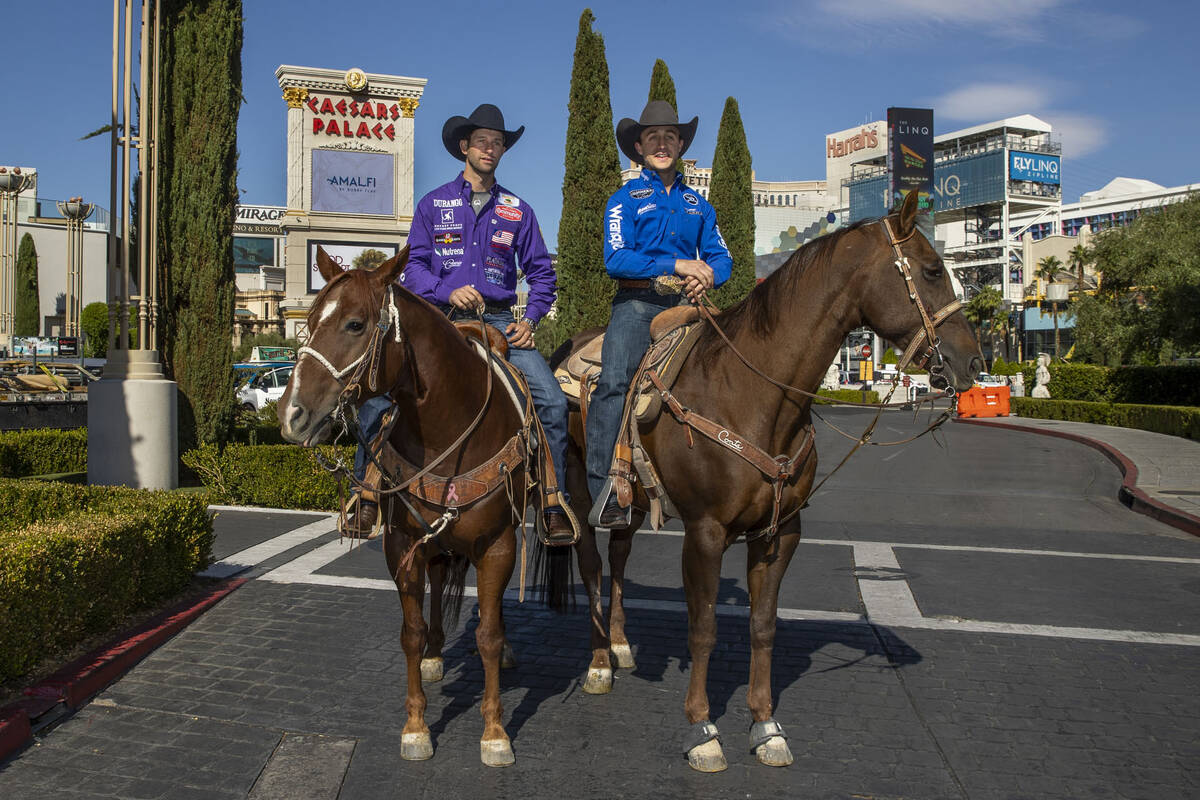 Cowboys Shane Hanchey, left, and Sage Kimzey make the rounds at Caesars Palace to promote the u ...