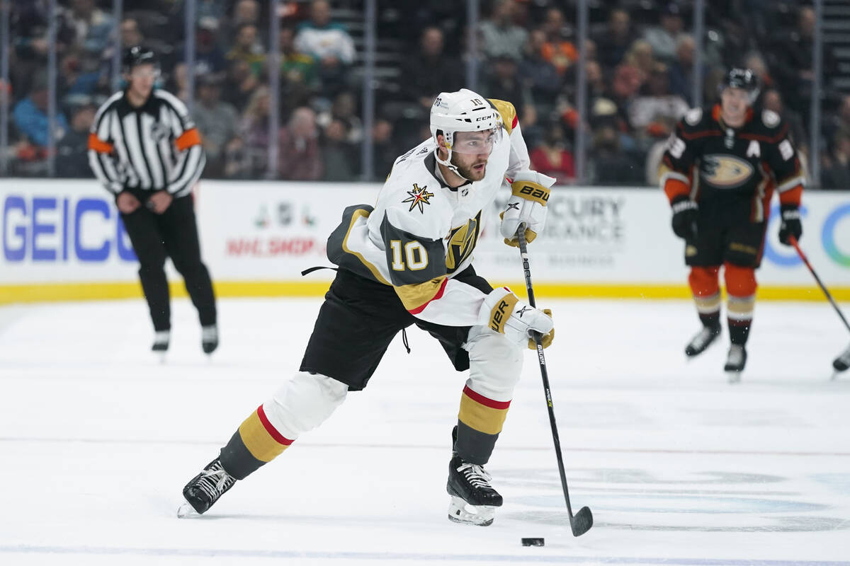 Vegas Golden Knights' Nicolas Roy moves the puck during the first period of an NHL hockey game ...