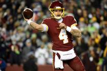 Washington Football Team quarterback Taylor Heinicke throws the ball during an NFL football gam ...