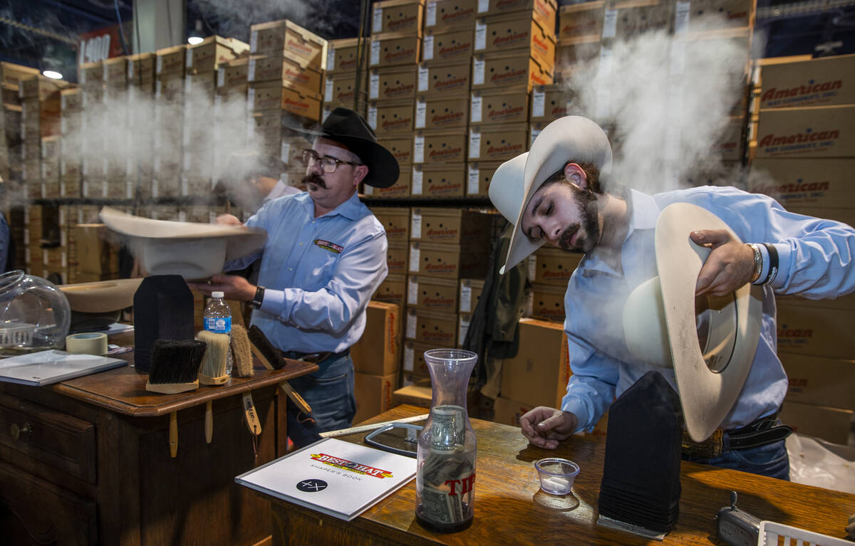 Danny Adams, left, and Jeremy Lynch with the Best Hat Store of Fort Worth reshape hats for cust ...