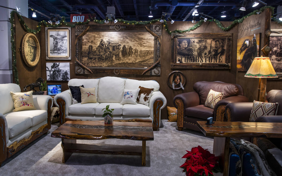 A room full of Ernie Apodaca hand crafted furniture on display for sale during the opening nigh ...