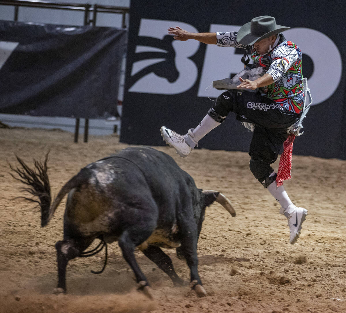 Competitor David Robles of Mexico leaps over a bull during the Bullfighters Only event at the W ...